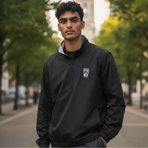 Spring Hill College black long sleeve wind breaker jacket.